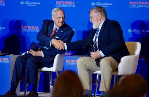 Al Mohler shaking hands with Doug Wilson